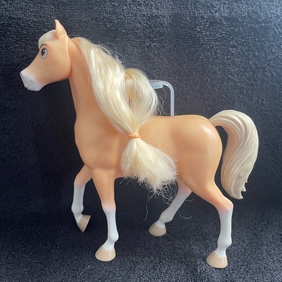 A collection of DreamWorks toy horses from “Spirit Riding Free” - Picture 11 of 15